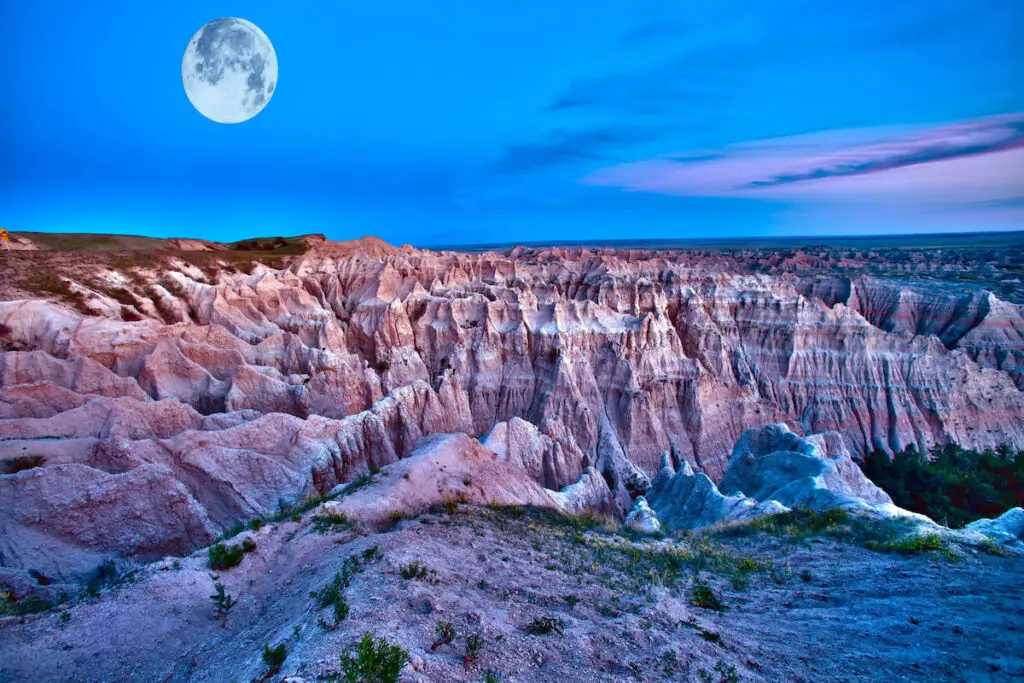 Badlands Dusk with Full Moon on the Sky. Badlands National Park, South Dakota