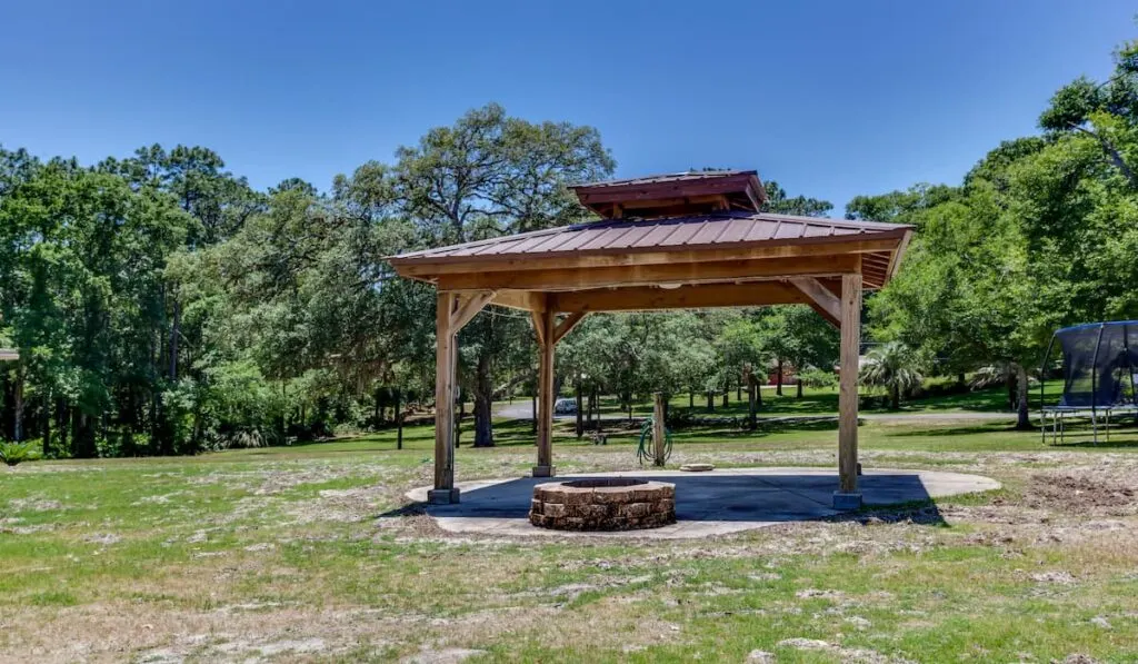 Fire pit with wooden canopy
