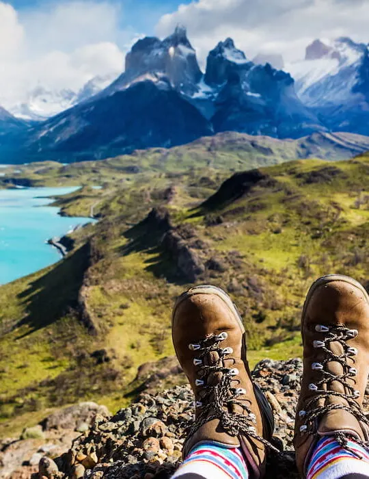 Girl-hiking-boots-having-fun-and-enjoying-wonderful-breathtaking-mountain-view