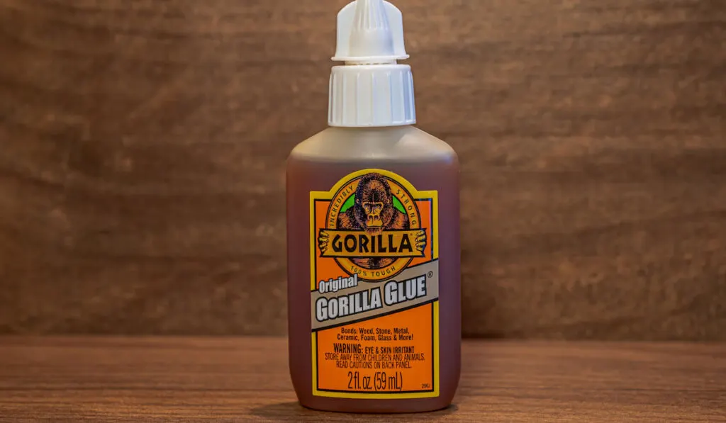 Gorilla Glue on wooden background