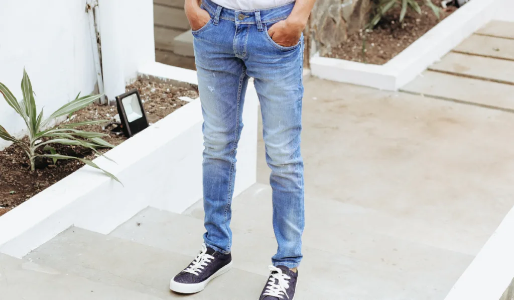 Man with denim pants