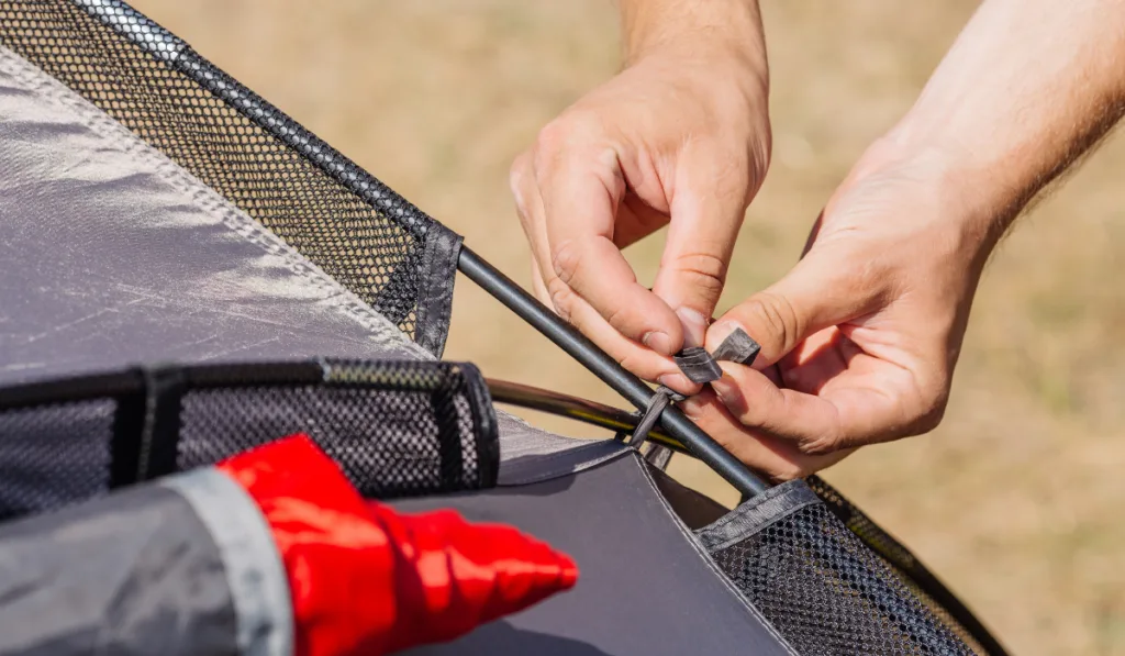 Tied the tent rope with tent pole
