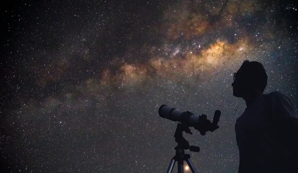 man with a telescope watching stars, Stargazing concept