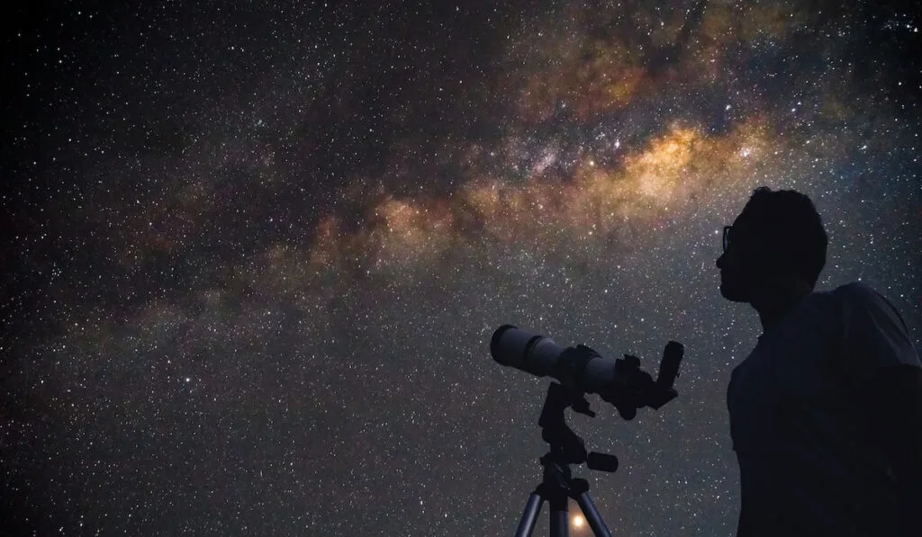 man with a telescope watching stars, Stargazing concept 