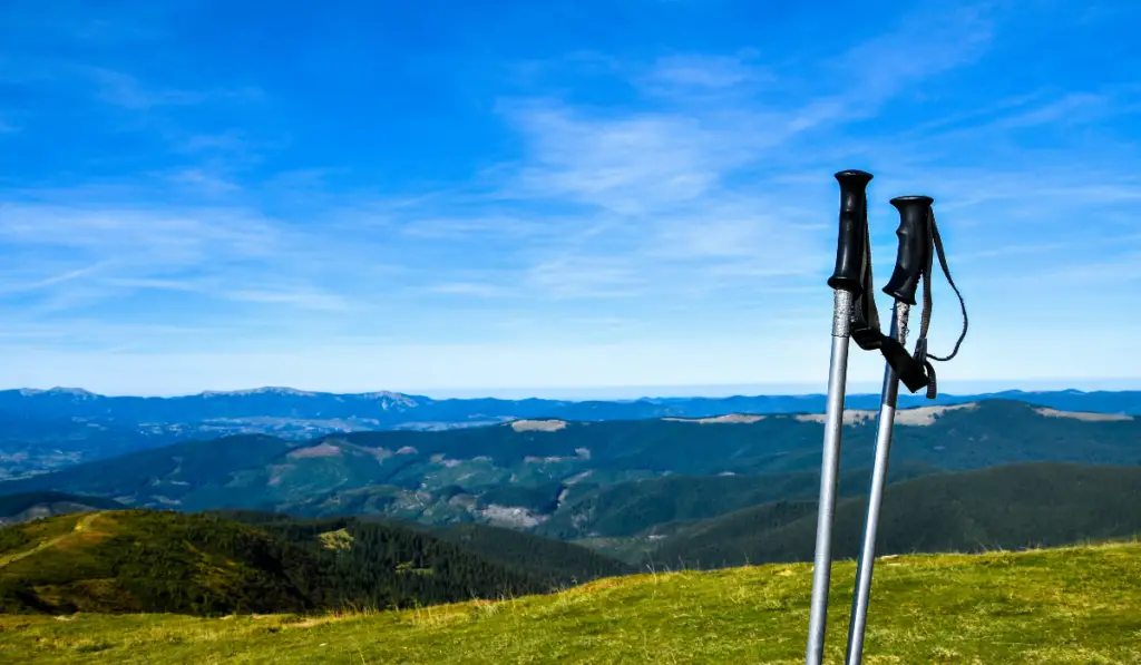 Trekking poles at top of mountain