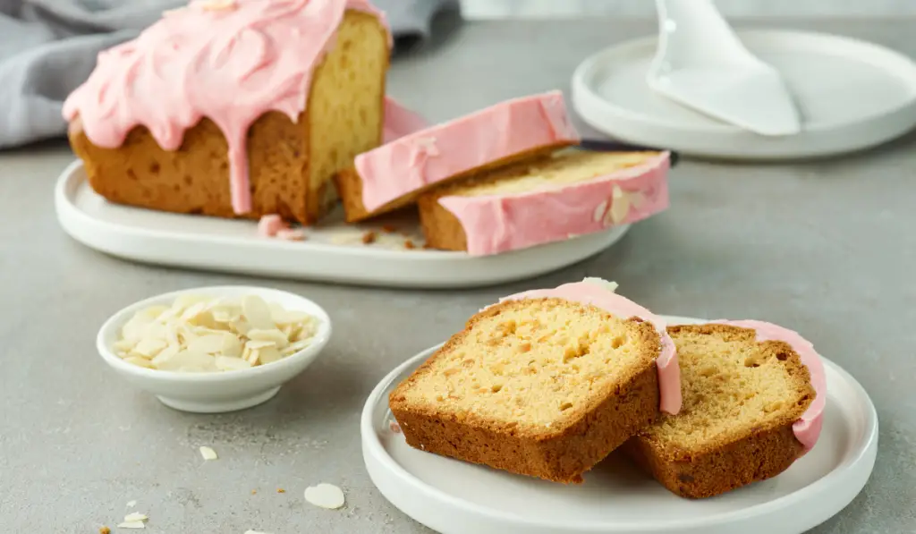 sliced sweet bread on grey table